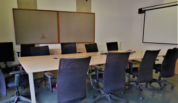 The Board Room at COEP's Bhau Institute, a professional space for strategic meetings and collaboration.